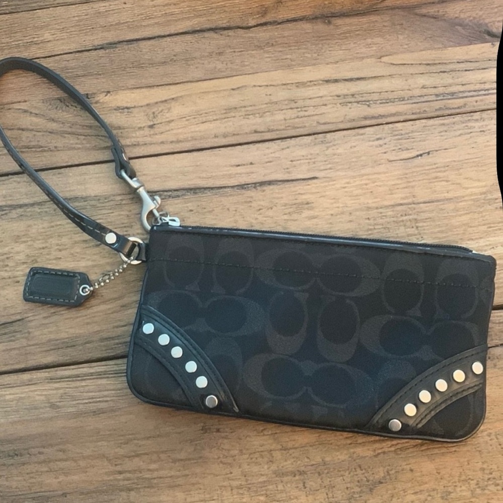 Coach black wristlet with studs